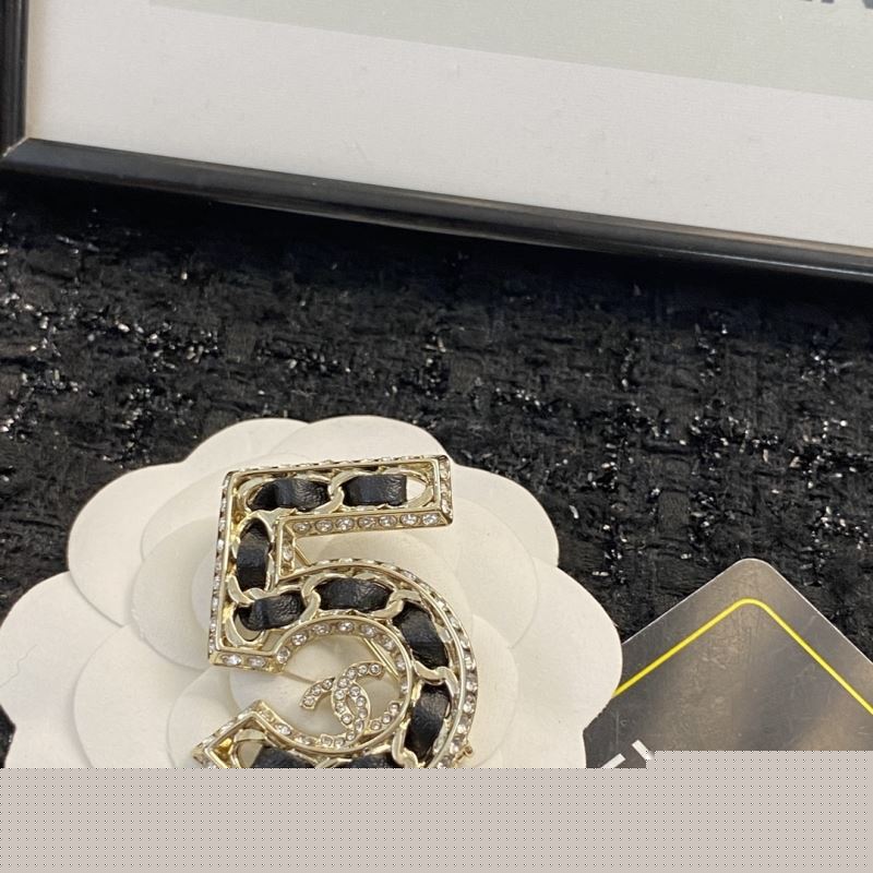 Ch*el brooches